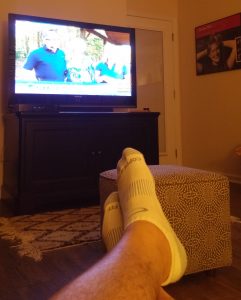 Kicking up my swollen ankles to watch my fifteen minutes of fame on the Telly.